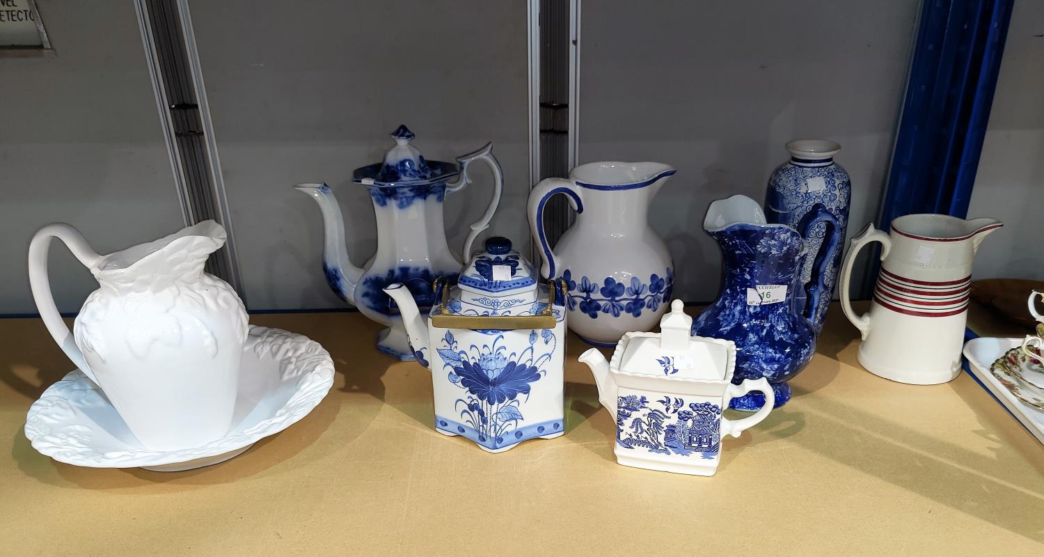 A collection of blue & white jugs, etc., 19th century and later