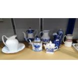 A collection of blue & white jugs, etc., 19th century and later