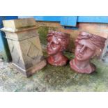 A pair of terracotta head planters; a square section chimneypot