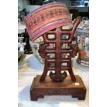 A Chinese carved wooden stand, height 39cm and a Chinese hat