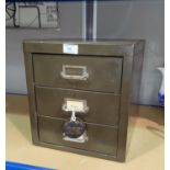 A metal 3 height stationery filing cabinet