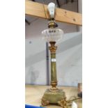 A 19th century Corinthian column oil lamp in onyx and brass, with dimple cut reservoir