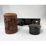 A carved bamboo cylindrical pot; a lacquered bookstand; a composition pot decorated with dragon,