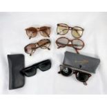 A pair of black sunglasses, Ray-Ban B&L Wayfarer Nomads, in soft case; a classic pair of Ray-Ban
