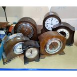 Six 1930's mantel clocks in oak and stained wood cases