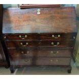 A Georgian crossbanded mahogany bureau with fall front fitted interior, 3 long and 2 short drawers