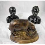 After Delabrierre: a modern bronze figure of a pig, on oval base, length 24 cm; a pair of African