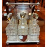 A silver plated 4 bottle cruet; other silver plate and pewter; a white metal fob watch (a.f.); a