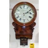 An early 19th century drop dial wall clock in figured mahogany case, with single train fusee