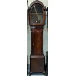 A Georgian mahogany longcase clock case, the arched hood with fretwork pediment and turned side