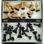 A 19th century stained wood chess set, king 9 cm, and a folding box/board, 30 cm