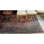 A Bokhara carpet, rust ground with 5 row of gulls to the field, 276 cm x 186 cm