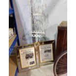 A wrought iron 'tailor's dummy'; 2 framed news clippings: "Titanic" & "President Kennedy"