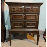 A late 17th/early 18th century country made oak chest on stand, the upper section with 2 long and