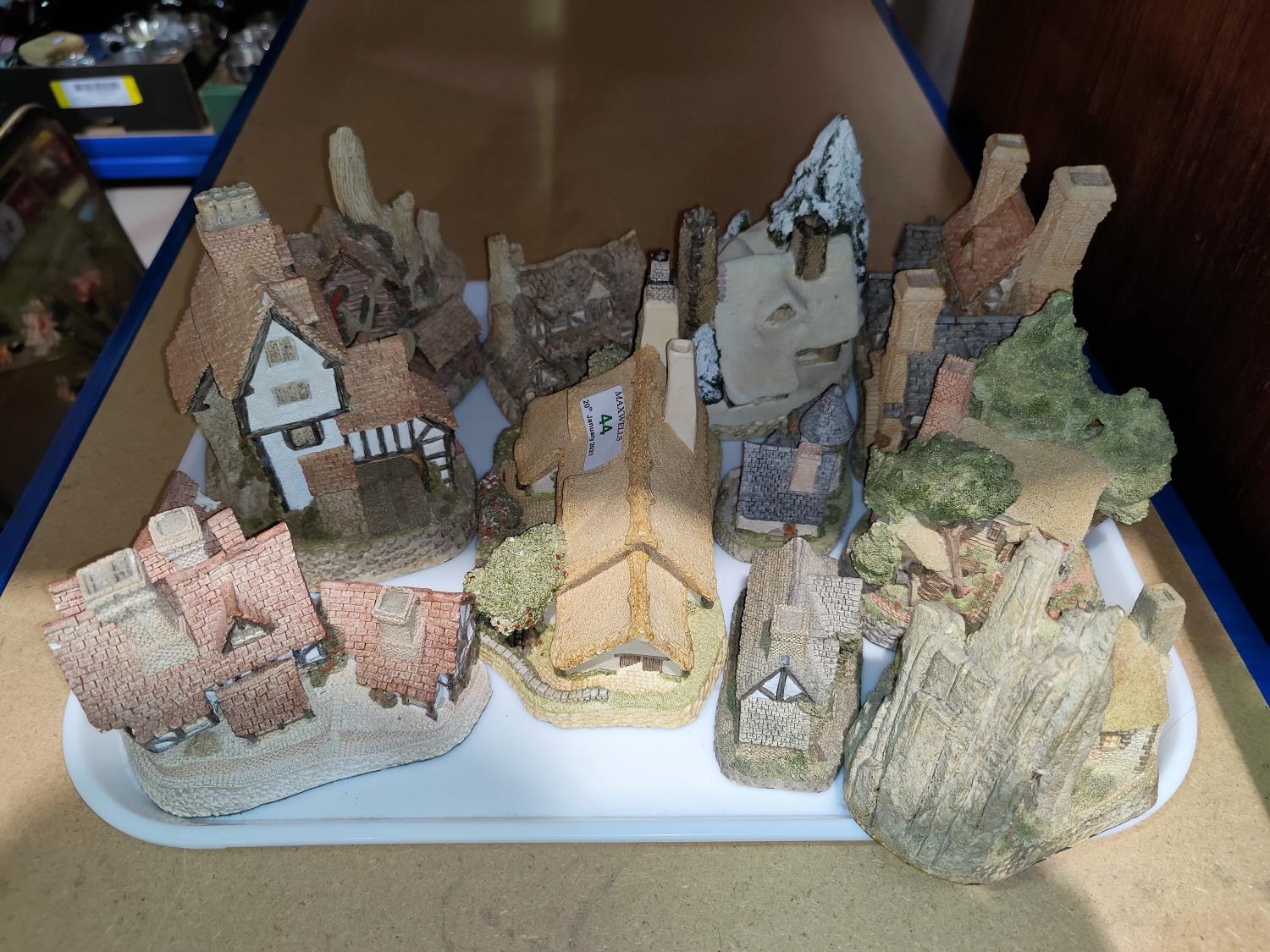 A collection of David Winter miniature cottages etc