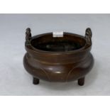A Chinese Yixing tea pot mounted with pewter fittings and decoration including dragons, seal mark to