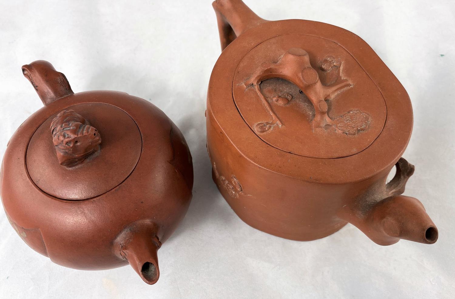 Two Yixing tea pots both with seal marks, 1 with character mark decoration, 1 with relief decoration - Image 2 of 4
