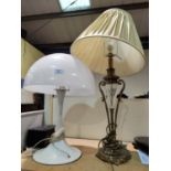 A 1960's white plastic table lamp with mushroom shade; a gilt metal and glass table lamp