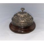 An early 20th century table bell, silver mounted with turned wood base, 10 cm; 2 silver cased hand