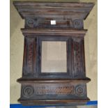 An 18th / 19th century 'Tabernacle' style rectangular picture / mirror frame with inlaid panels,