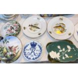 A pair of Spode plates decorated with birds; 6 fish plates; other decorative plates
