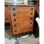 A 1960's teak 5 height chest of drawers in the G-Plan style