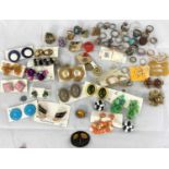 A selection of vintage and later costume jewellery, mainly earrings and rings (please note some