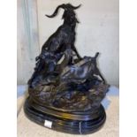 A modern bronze 'Animalier': 2 goats on rocky hillside, on oval marble plinth, height 30 cm