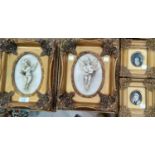 A pair of composition relief oval pictures of cherubs, gilt framed, 29 cm; a pair of miniature