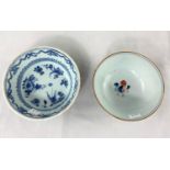 A Chinese ceramic bowl decorated with flowers, diameter 11cm and another small blue and white dish