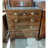 A late Georgian mahogany chest of 4 long drawers with oval brass drop handles, boxwood and ebony