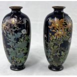 A pair of Japanese cloisonné vases dark blue ground with floral decoration , both bearing
