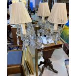 A cut glass and gilt metal chandelier with 4 branches