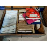 A large collection of mid/late 20th century single records contained in a wooden box