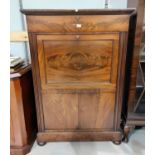 A 19th century figured mahogany secretaire in the Biedermeier style, with frieze drawer, fall