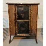 A Japanese side cabinet with single door, lacquer decoration of birds