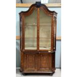 A 19th century walnut and marquetry-full height side cabinet in the Dutch manner, the upper
