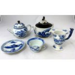 Two Chinese blue & white teapots; a similar helmet shaped cream jug; a teacup and saucer with 4