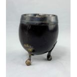 A Georgian coconut cup with hallmarked silver rim and mounts (marks worn; cup cracked)