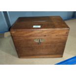 A 19th century stained wood donations box with brass side handles, 30 cm