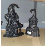 Two cast iron doorstops: "Mr Punch" and a dwarf