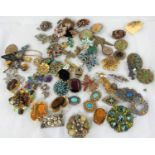 A selection of vintage costume jewellery, mainly brooches (please note some items may have stones