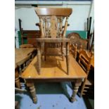 A Victorian style pine kitchen table with rectangular top, on turned legs; 4 (2 + 2) beech fiddle