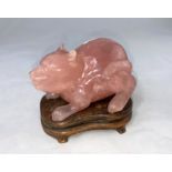 A rose quartz cat on stand, length 12cm