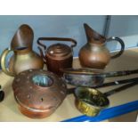 A 19th century copper and brass warming pan; a Middle Eastern pierced copper warming pan; a pair