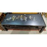 A modern black lacquer Chinese style rectangular coffee table with painted top