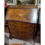 A Georgian style crossbanded mahogany fall front bureau with Sheraton style inlay, 4 drawers, on