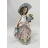 A Lladro Society figure: girl with pot of flowers, height 22 cm