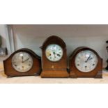 An Edwardian mantel clock in oak lancet top case; 3 Westminster chiming mantel clocks