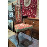 A Victorian walnut occasional chair with barley twist columns, high back, needlework upholstery,